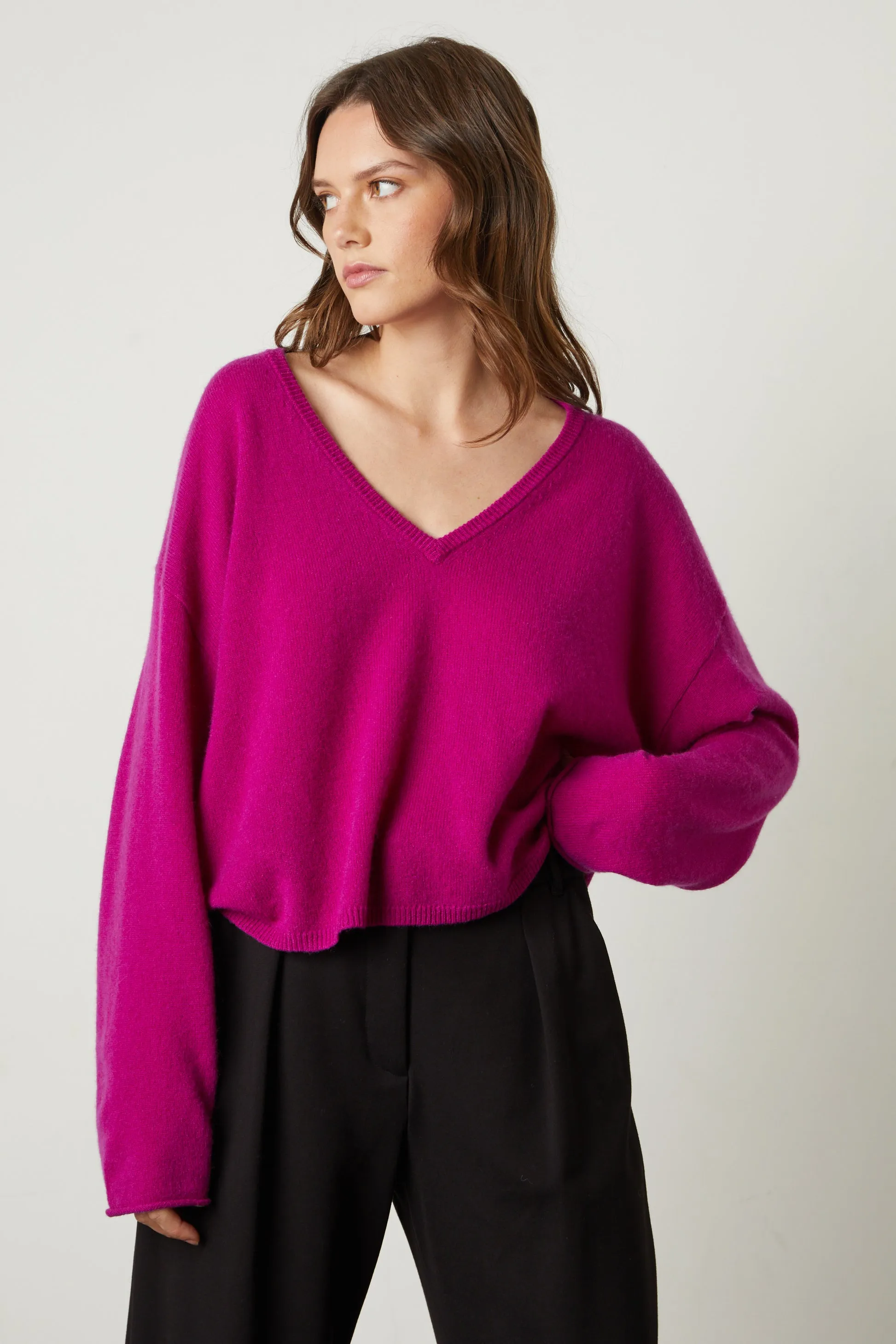 AMIKA CASHMERE V-NECK SWEATER IN MAGENTA