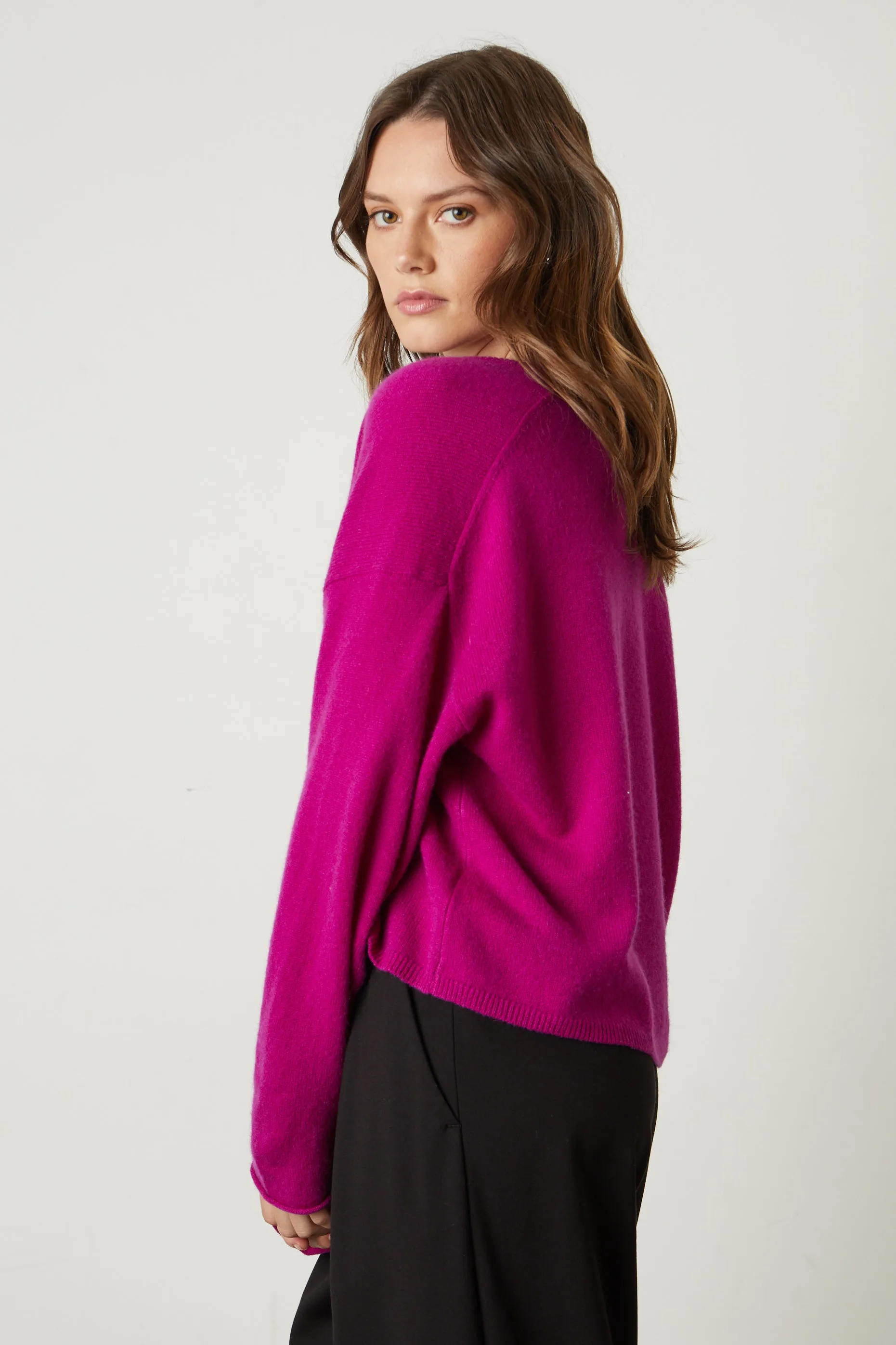 AMIKA CASHMERE V-NECK SWEATER IN MAGENTA