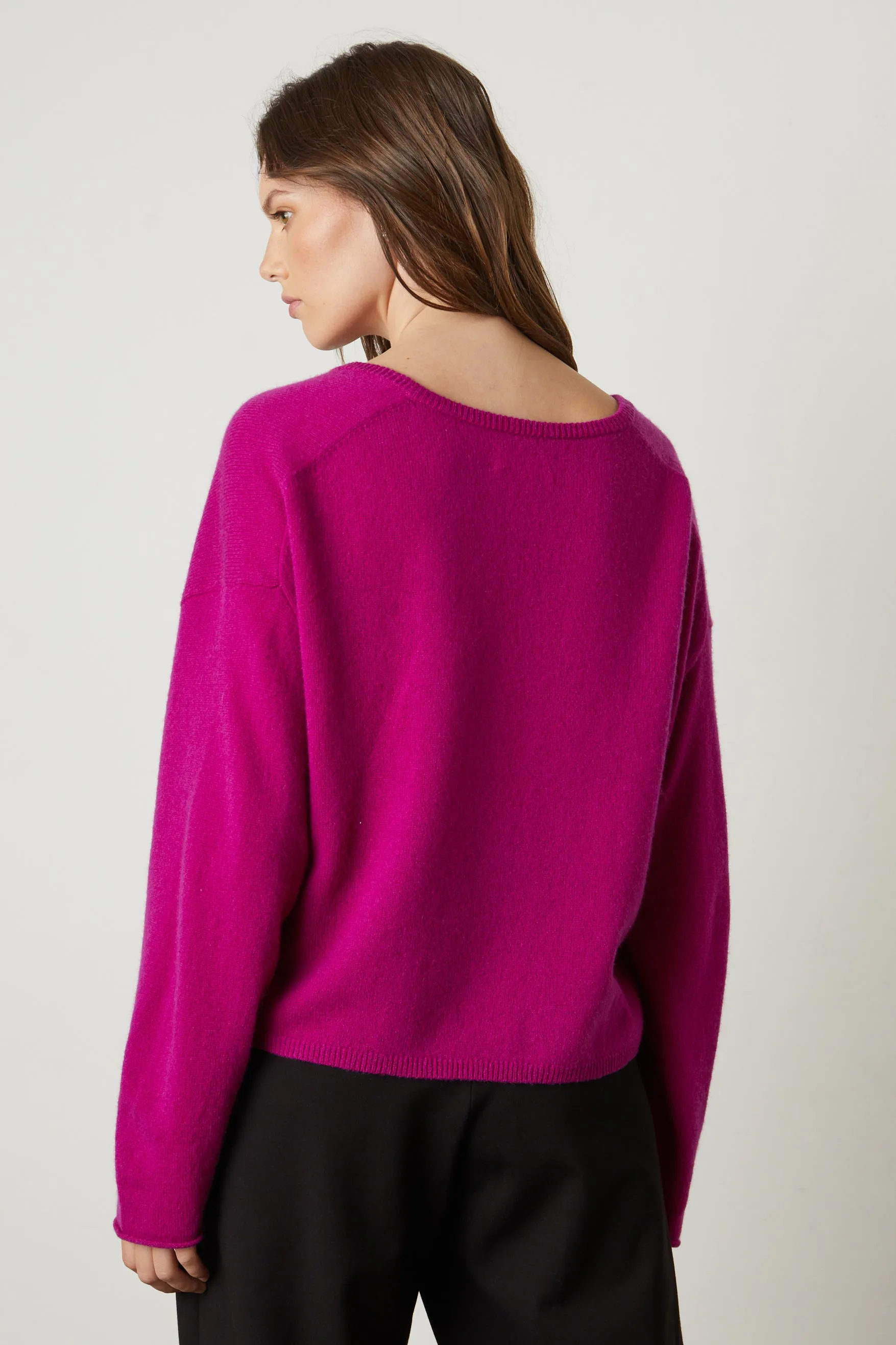 AMIKA CASHMERE V-NECK SWEATER IN MAGENTA