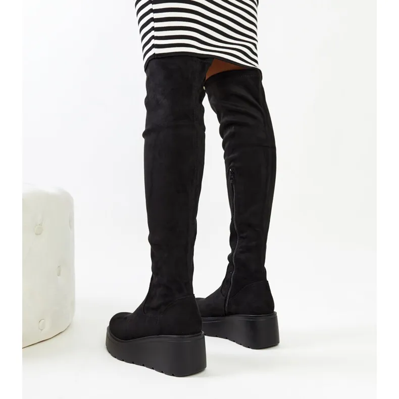 Black long wedge boots by Nafeesa