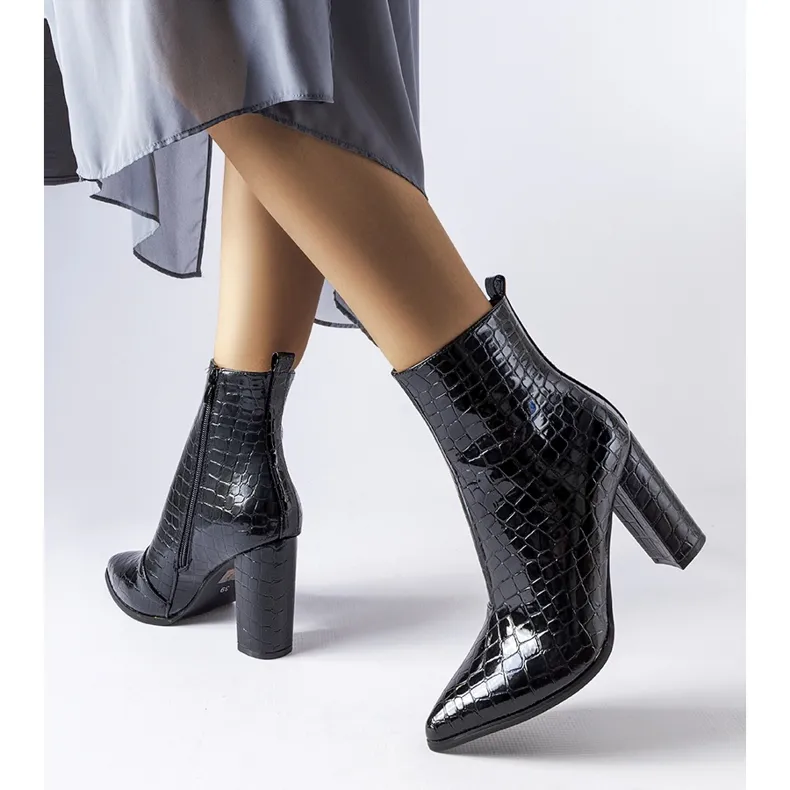 Black patent snakeskin ankle boots by Irpino