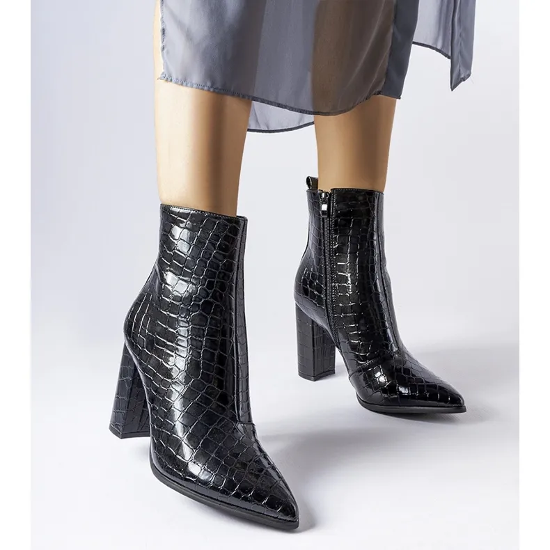 Black patent snakeskin ankle boots by Irpino