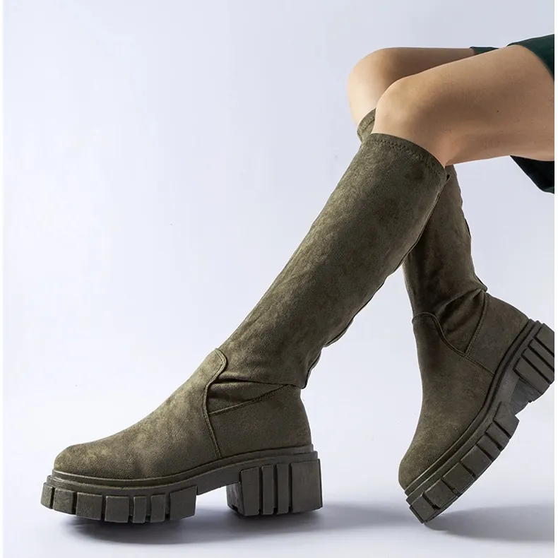 Green long suede boots by Donnino