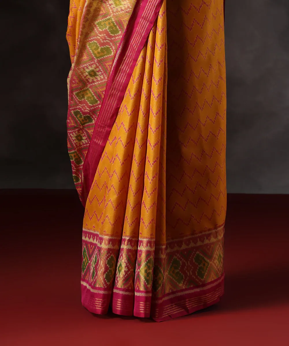 Handloom Mustard Pure Mulberry Silk Single Ikat Patola Saree With Hot Pink Tissue Border